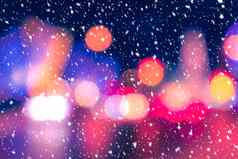 模糊灯头灯汽车灯笼晚上城市降雪摘要散景