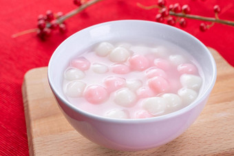 唐元汤圆美味的红色的白色大米饺子球小碗红色的背景亚洲节日食物中国人冬天冬至节日关闭