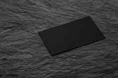 空白黑色的业务卡石头表面