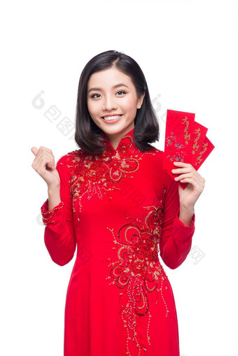 美丽的亚洲女人持有红色的口袋里幸运的钱泰特假期月球一年文本幸福幸运的