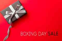 拳击一天出售礼物盒子红色的背景