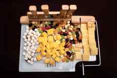 奶酪菜奶酪干水果切片董事会设备切片特殊的董事会切片奶酪奶酪干水果