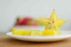 异国情调的杨桃阿维罗亚杨桃白色板木减少董事会健康的食物新鲜的有机明星苹果水果