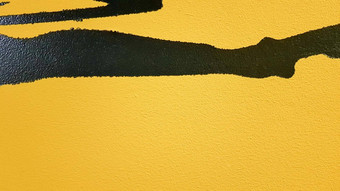 黑色的摘要油漆溅滴明亮的<strong>黄色</strong>的背景黑色的油漆溅<strong>黄色</strong>的背景概念艺术的想法油漆刷纹理<strong>黄色</strong>的黑色的背景