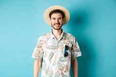 快乐积极的旅游夏威夷衬衫稻草他微笑相机概念旅游夏天假期