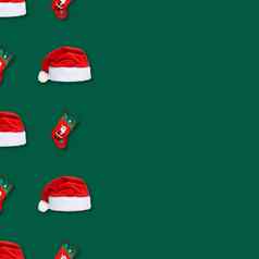 圣诞老人老人圣诞节红色的他圣诞节袜子孤立的绿色背景圣诞节无缝的模式复制空间