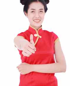 女人穿红色的旗袍拇指概念快乐中国人一年孤立的白色背景