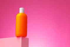 护肤品美产品容器粉红色的背景