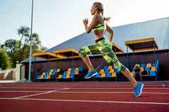 女运动员运行跑步机体育运动背景