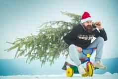 兴奋骑自行车的人圣诞老人他松圣诞节树孩子们自行车快乐赶时髦的人携带圣诞节树白色雪男人。骑三轮车雪景观