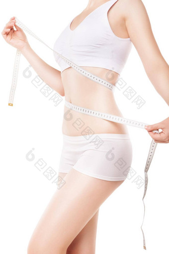 减肥女人测量大腿磁带