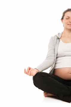 怀孕了女人放松瑜伽白色