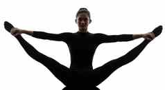 女人锻炼体操瑜伽伸展运动分裂轮廓