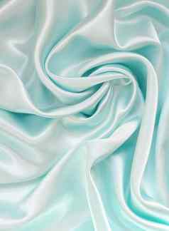 光滑的优雅的蓝色的丝绸背景