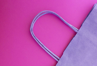 概念浪费生活纸可重用的购物袋塑料前视图紫色的背景