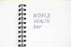 写世界健康一天螺旋笔记本复制空间健康概念平躺