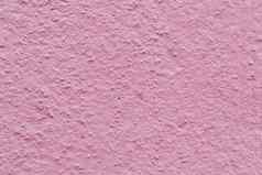 粉红色的油漆贴混凝土墙纹理背景
