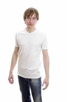 休闲年轻的男人。白色t恤牛仔裤孤立的白色