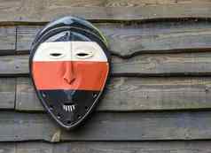 经典非洲面具木墙背景文化非洲传统的背景