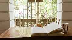 咖啡书窗口周日早....阅读书早....阳光舒适夏天情绪假期休闲文学放松概念