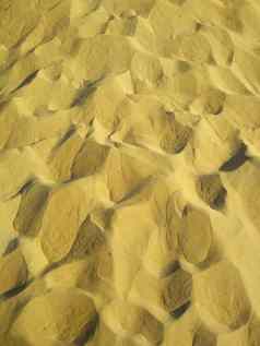 表面干黄色的沙子粗糙的表面