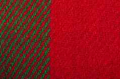 手工制作的针织绿色红色的背景
