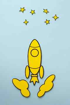黄色的卡通火箭飞行星星