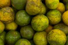 绿色新鲜的成熟的绿色橘子纹理食物概念热带异国情调的水果健康的维生素食物概念