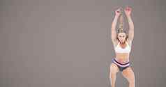 运动健身女人跳空白棕色（的）背景