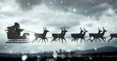 圣诞老人飞行雪橇驯鹿天空