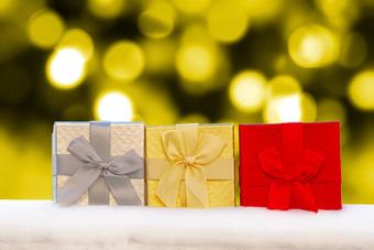 色彩鲜艳的gif盒子礼物雪金圣诞节灯背景