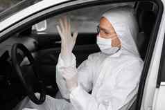 男人。保护西装医疗面具橡胶手套保护细菌病毒规划开车保护面具检疫世界流感大流行科维德冠状病毒感染