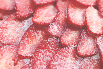 新鲜的维生素浆果背景切片草莓糖奶油<strong>填充</strong>背景红色的健康的美味的草莓的糖李子<strong>纹理</strong>