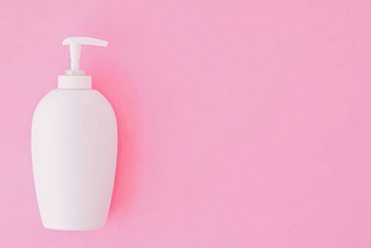 瓶抗菌液体肥皂手洗手液粉红色的背景卫生产品医疗保健
