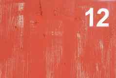 饱经风霜的红色的油漆墙纹理数量刷中风