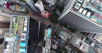 城市前视图摩天大楼建筑无人机在香港香港城市空中视图城市景观飞行在香港香港城市发展建筑能源权力基础设施金融业务中心亚洲