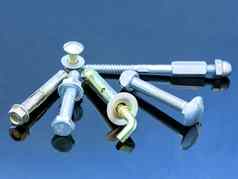 screwbolts螺杆坚果悬挂器螺栓洗衣机蓝色的背景建设概念