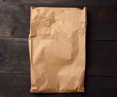 开放棕色（的）纸袋食物包装棕色（的）木后台