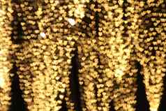 黄色的黄金心形的挂情人节背景色彩斑斓的照明散景白色装饰晚上背景壁纸模糊情人节爱图片照明心形状的软晚上摘要