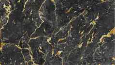 自然黑色的黄金大理石石头纹理背景黑色的黄金大理石表面室内外制造商