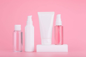 集护肤品化妆品明亮的粉红色的背景概念每天护肤品例程美产品