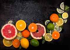 柑橘类背景新鲜的柑橘类水果柠檬橙子酸橙葡萄柚木背景