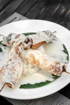 鱼串奶油椰子酱汁大米越南