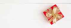 红色的礼物盒子木表格背景爱浪漫礼物庆祝活动周年纪念日惊喜桌子上快乐生日捐赠慈善机构情人节一天2月概念