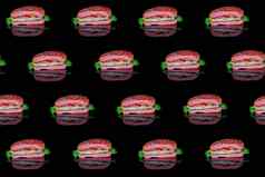 色彩斑斓的模式红色的汉堡黑色的背景前视图