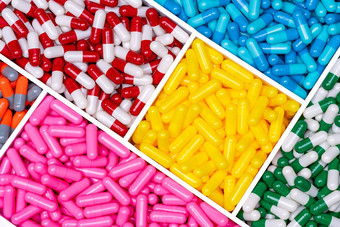 前视图胶囊药片塑料盒子黄色的粉红色的蓝色的红白绿白桔灰色胶囊药片制药行业抗生素维生素补充胶囊药片