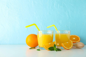 平躺作文新鲜的橙色果汁木榨汁机薄荷橙子木榨汁机白色表格颜色背景空间文本新鲜的自然喝水果