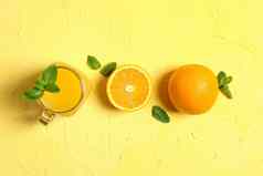 平躺作文橙色薄荷玻璃Jar新鲜的橙色汁颜色背景空间文本新鲜的自然饮料