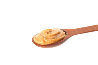 奶油花生黄油木勺子孤立的白色背景特写镜头传统的产品美国厨房