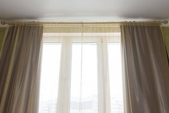 窗帘薄纱窗帘大塑料窗户公寓特写镜头